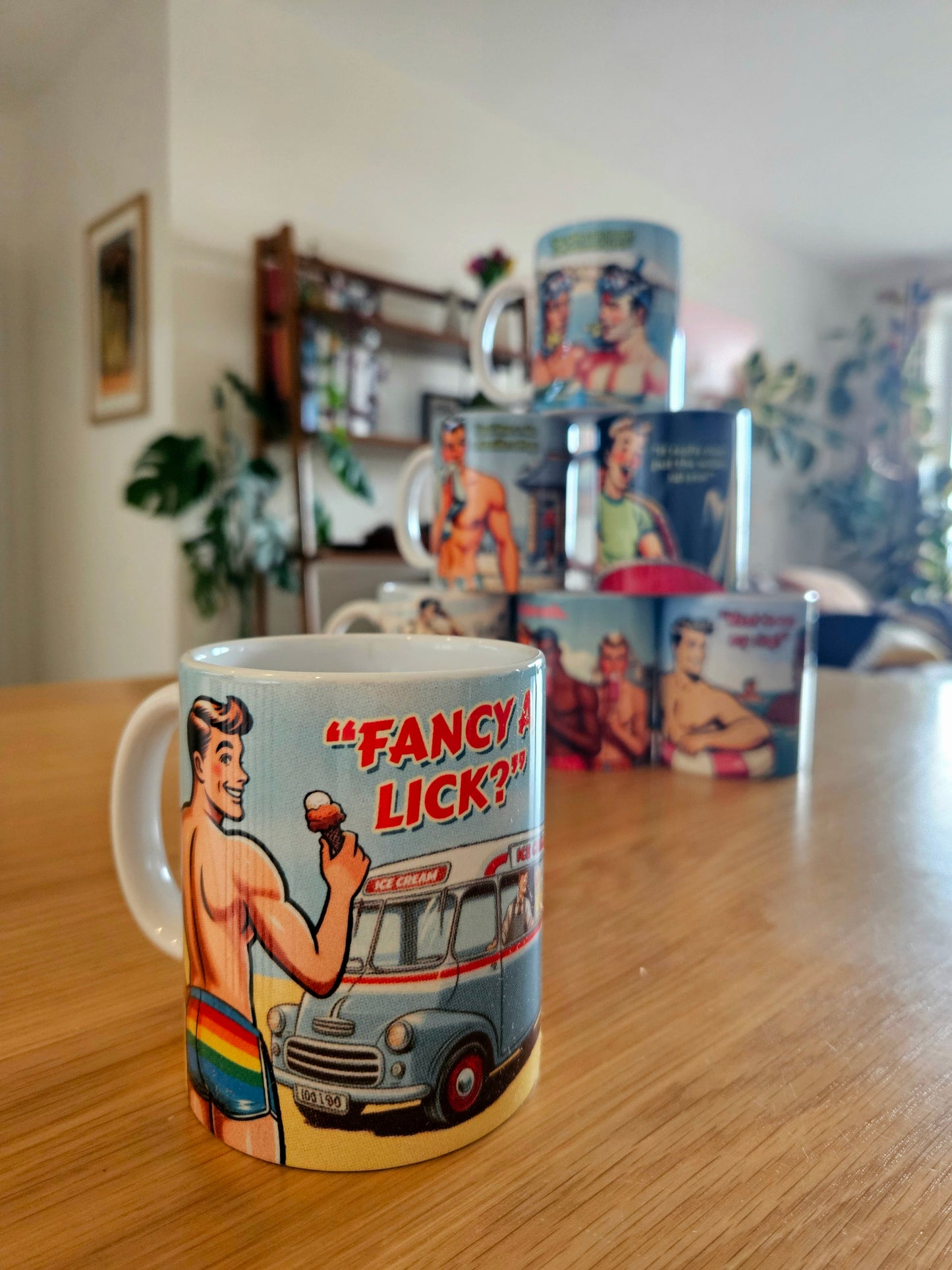 Funny gay ceramic mug inspired by saucy seaside postcard cartoon humour: Fancy A Lick?