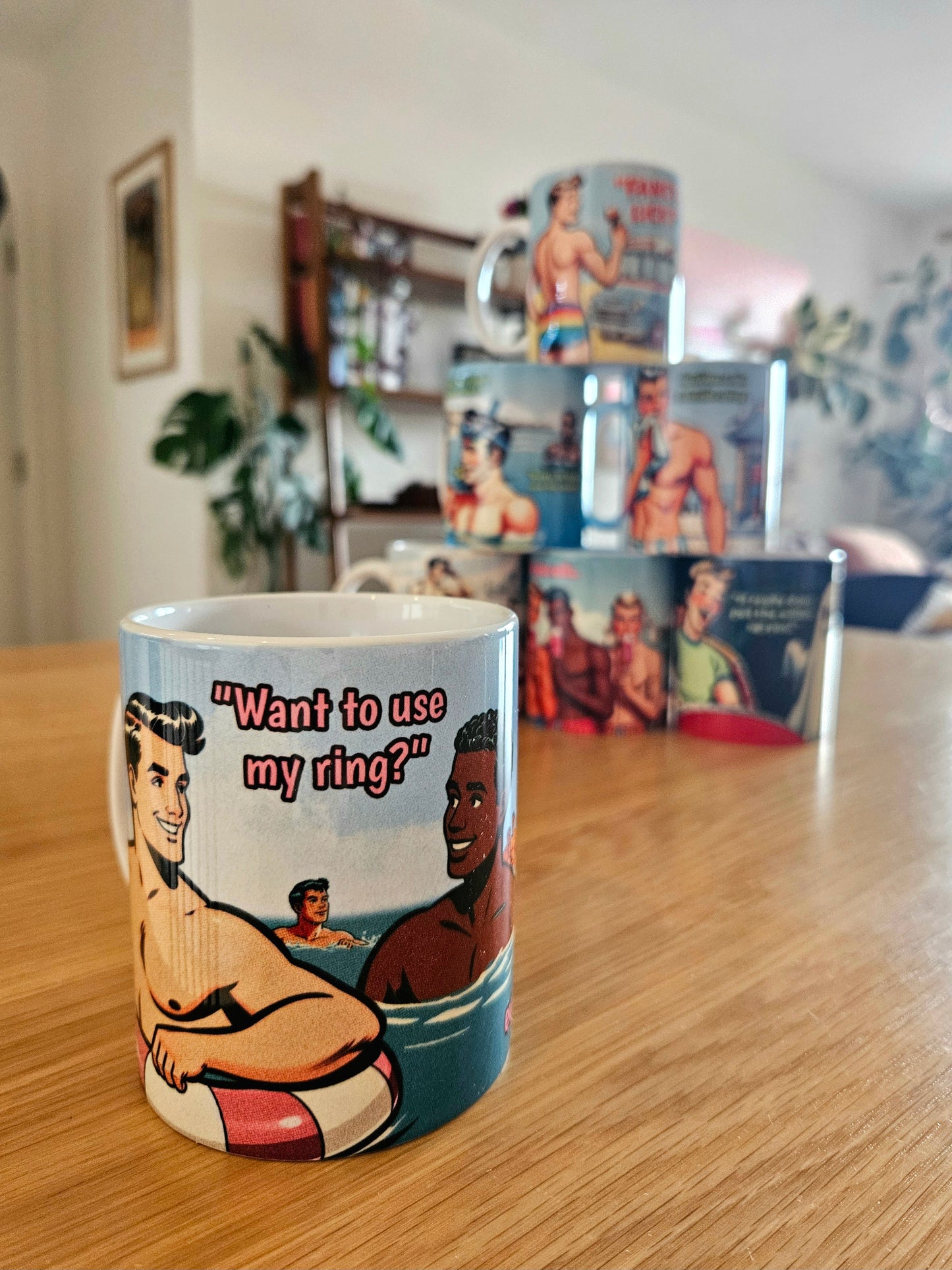 Funny gay ceramic mug inspired by saucy seaside postcard cartoon humour: Use My Ring
