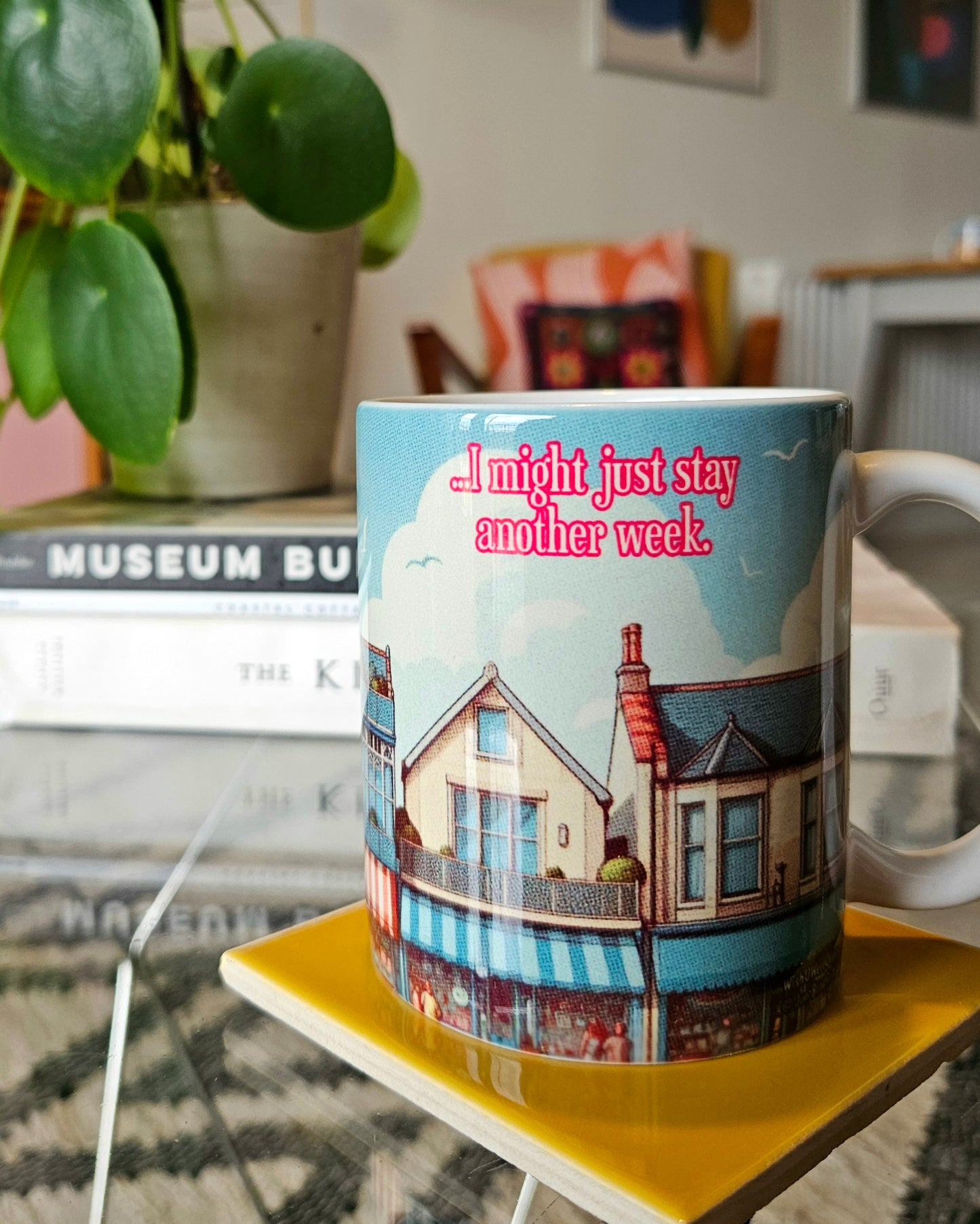 Funny gay ceramic mug inspired by saucy seaside postcard cartoon humour: This Place Sucks