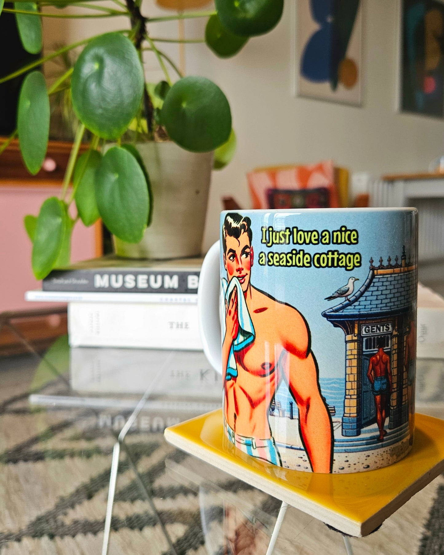 Funny gay ceramic mug inspired by saucy seaside postcard cartoon humour: Seaside Cottage