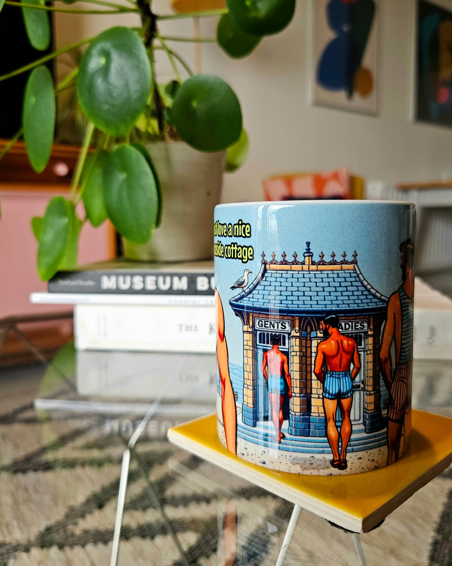 Funny gay ceramic mug inspired by saucy seaside postcard cartoon humour: Seaside Cottage