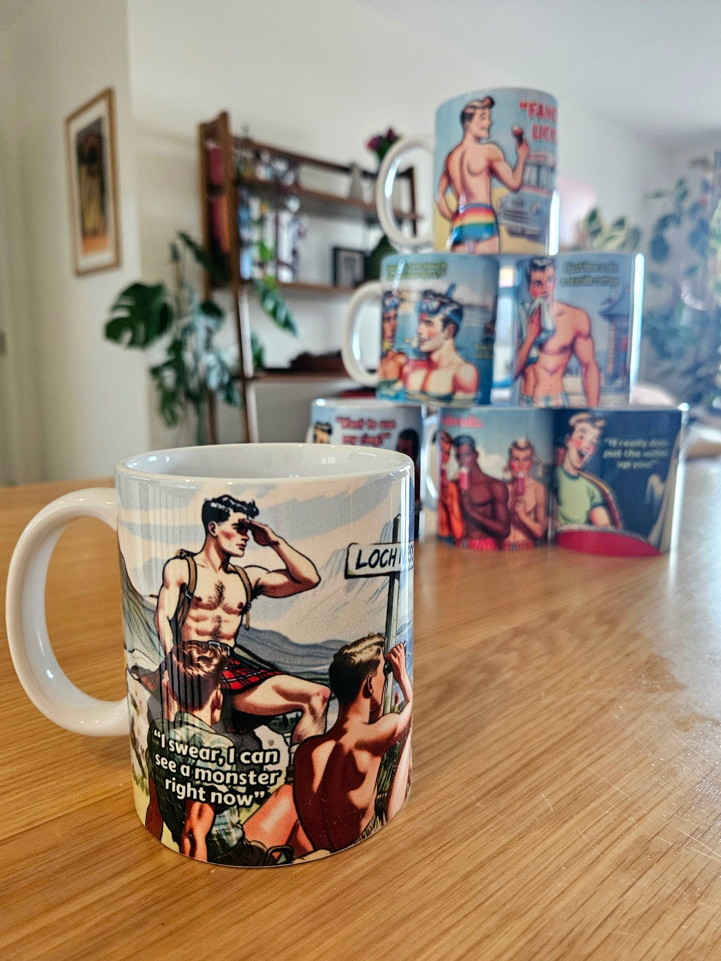 Funny gay ceramic mug inspired by saucy seaside postcard cartoon humour: Monster
